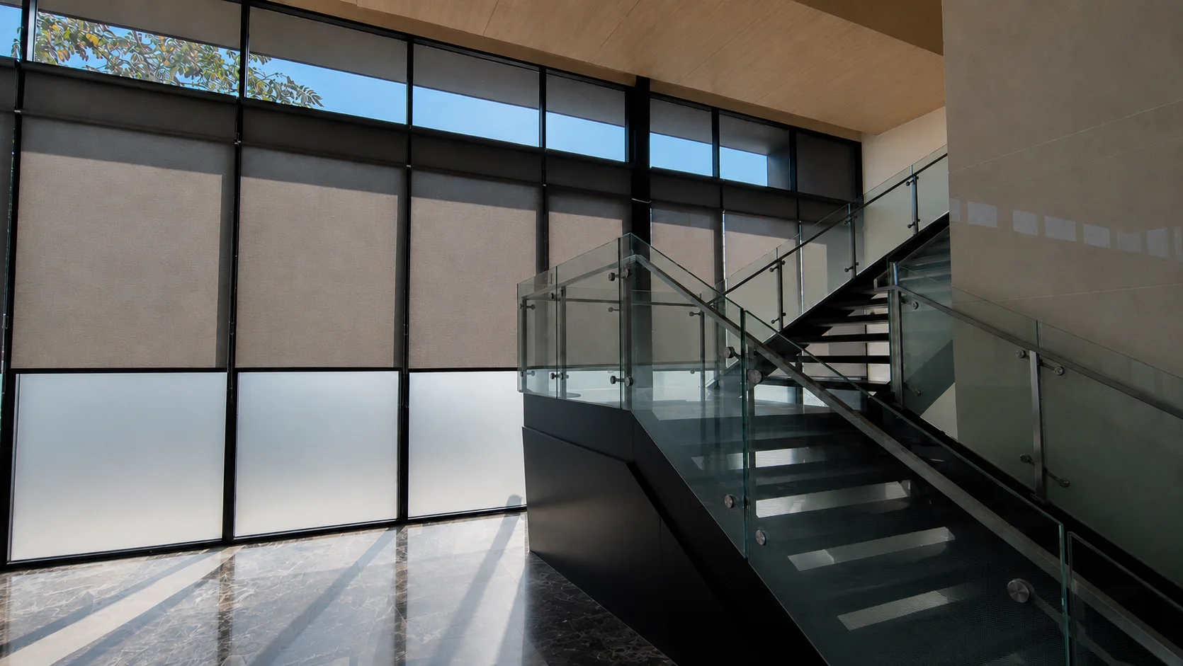 Sleek office space with window blinds installed