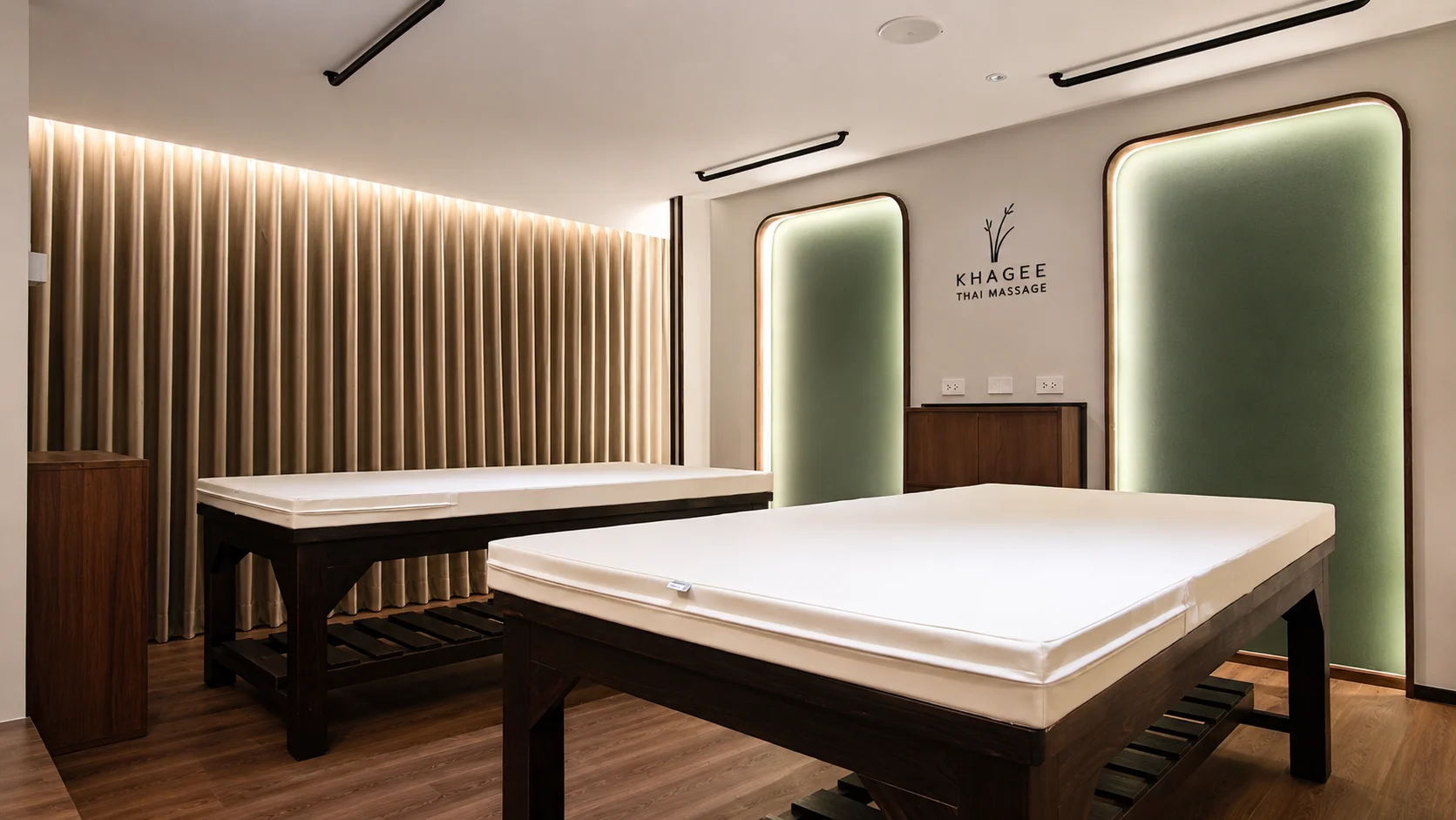 Thai massage spa room with curtains along the wall