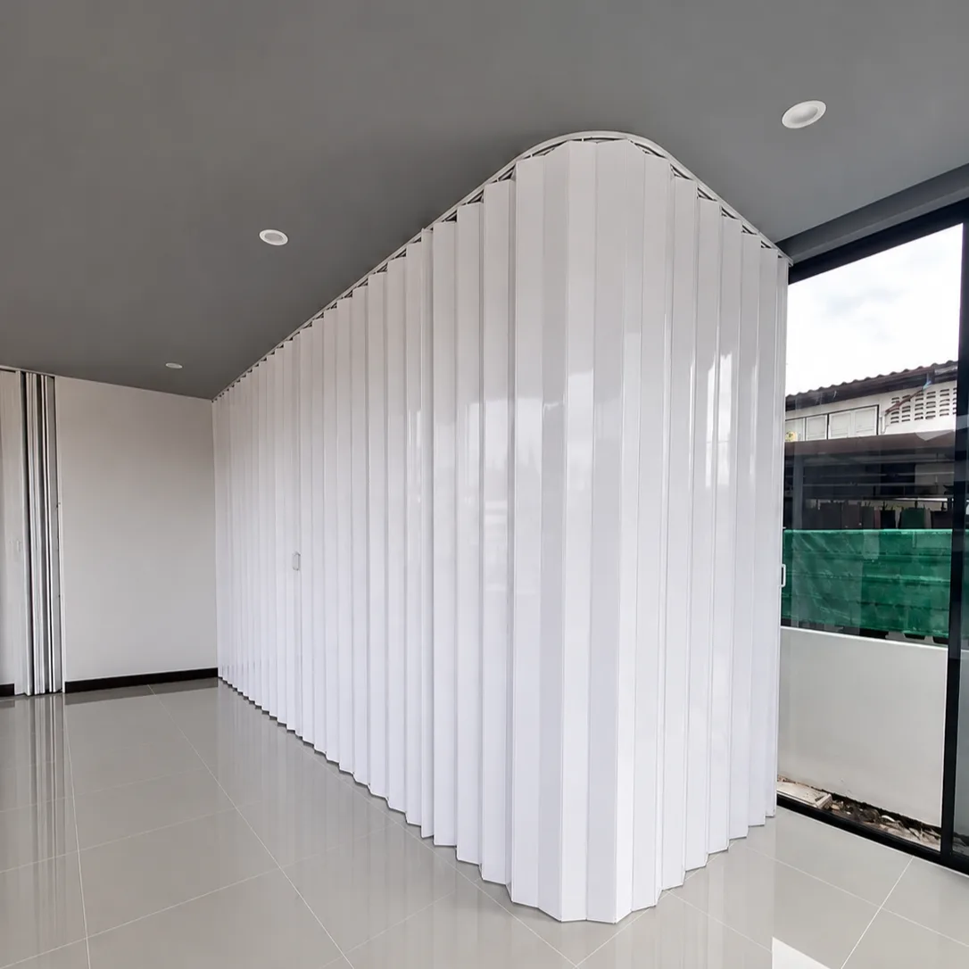 White accordion room divider curving along a room's ceiling line, glossy tile flooring
