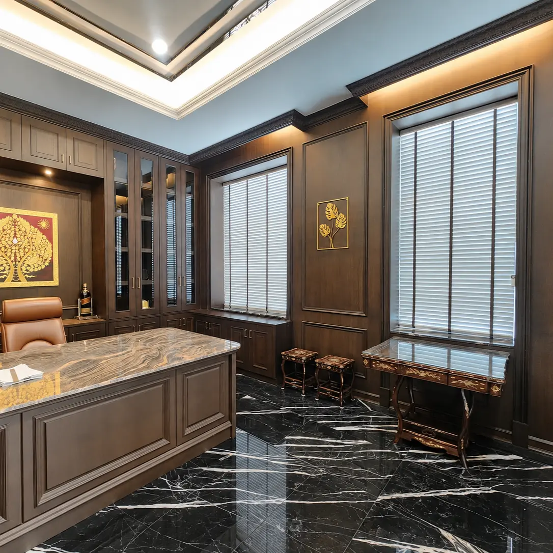 Wood-paneled home office with marble desk, leather chair and Thai-motif artwork